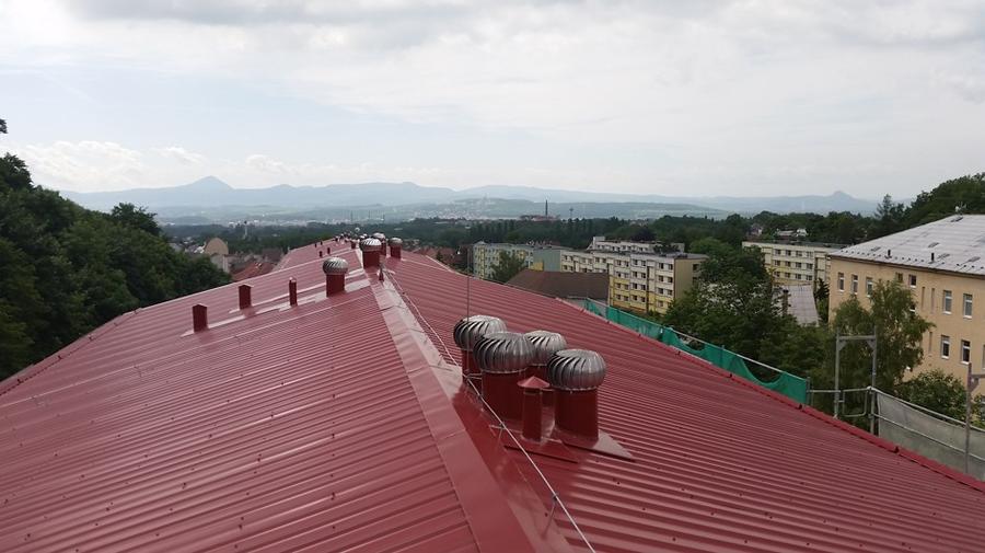 Rekonstrukce rovné střechy na šikmou